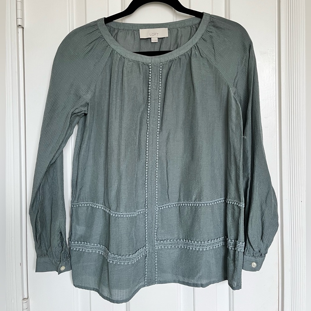 Long sleeve pom detail, button cuff